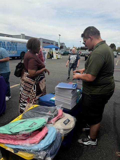 school supplies handoff